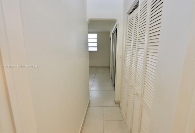 2920 Point E Dr Unit N208, Aventura, FL 33160 - corridor featuring light tile patterned floors and arched walkways