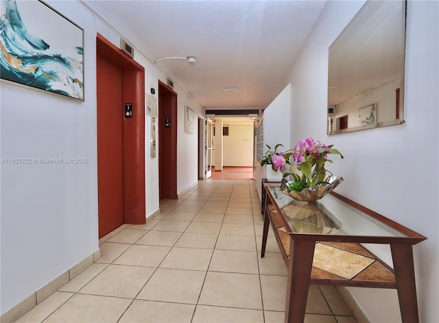 2920 Point E Dr Unit N208, Aventura, FL 33160 - corridor featuring elevator and light tile patterned floors