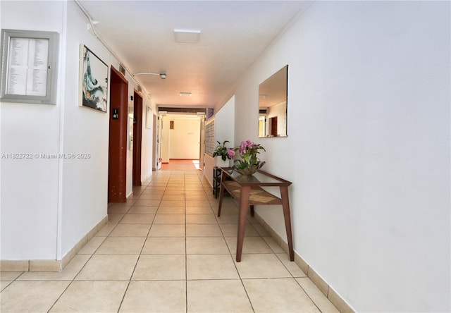 2920 Point E Dr Unit N208, Aventura, FL 33160 - hall with light tile patterned floors and baseboards