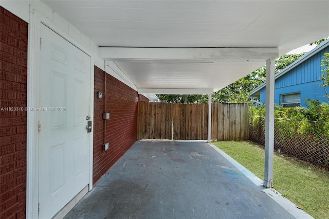 3818 Everglades Rd, Palm Beach Gardens, FL 33410 - view of patio featuring an attached carport