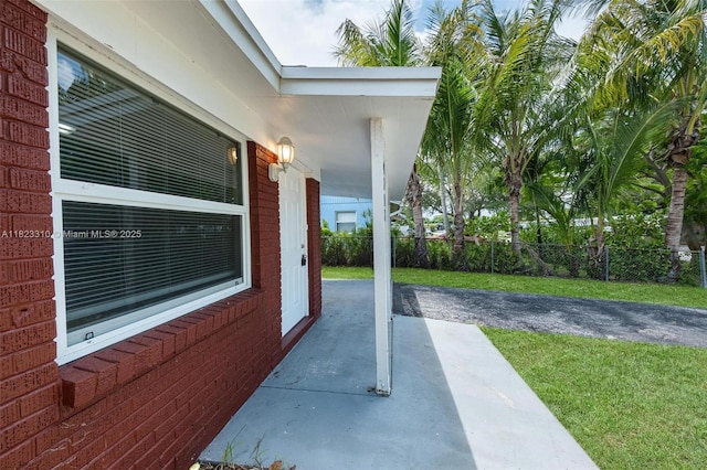 3818 Everglades Rd, Palm Beach Gardens, FL 33410 - view of patio featuring a carport
