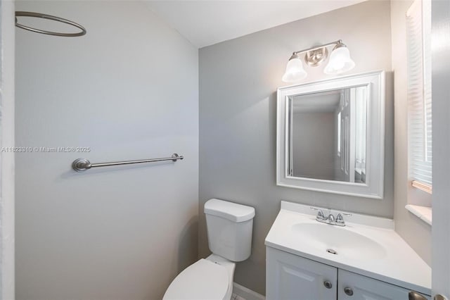 3818 Everglades Rd, Palm Beach Gardens, FL 33410 - half bath featuring vanity and toilet