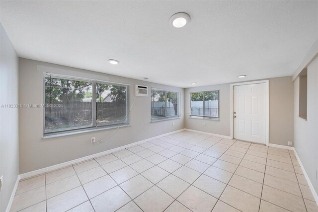 3818 Everglades Rd, Palm Beach Gardens, FL 33410 - spare room featuring light tile patterned floors and recessed lighting