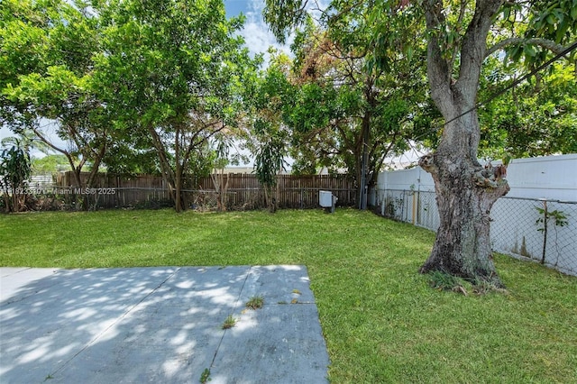 3818 Everglades Rd, Palm Beach Gardens, FL 33410 - fenced backyard featuring a patio area