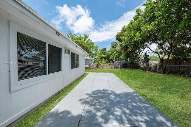 3818 Everglades Rd, Palm Beach Gardens, FL 33410 - fenced backyard with a patio area