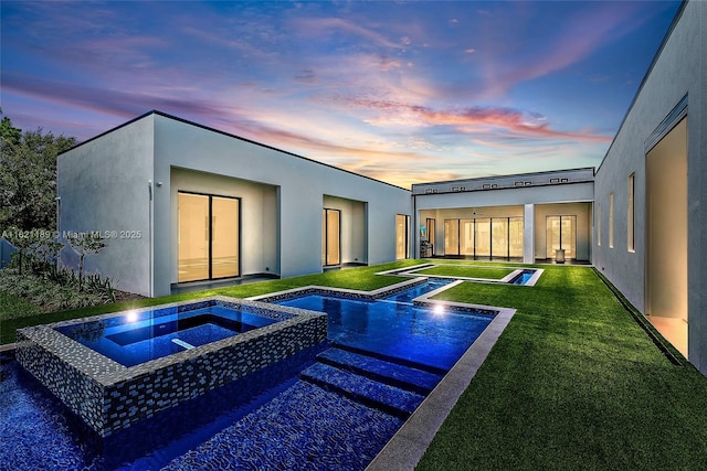 9741 SE Gomez Ave, Hobe Sound, FL 33455 - swimming pool with an in-ground hot tub and a yard