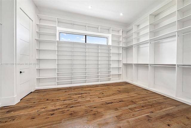 9741 SE Gomez Ave, Hobe Sound, FL 33455 - walk in closet with wood finished floors