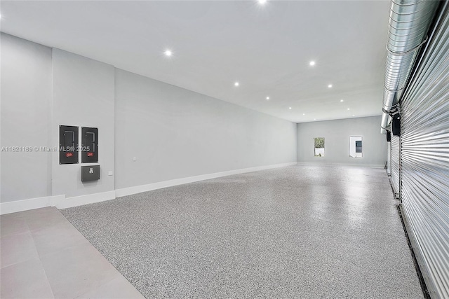 9741 SE Gomez Ave, Hobe Sound, FL 33455 - garage featuring recessed lighting