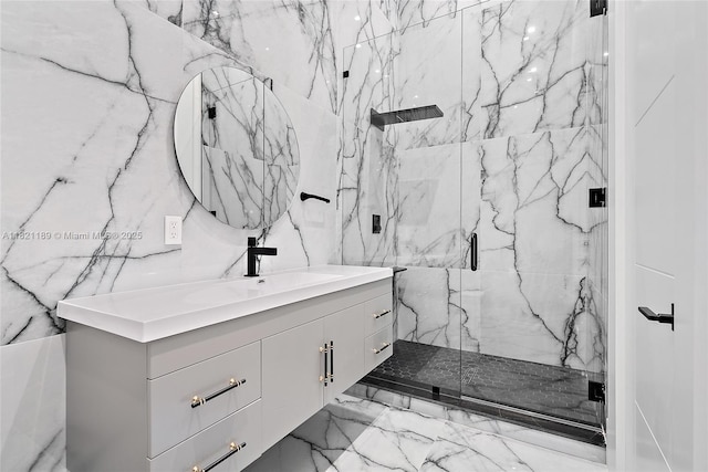 9741 SE Gomez Ave, Hobe Sound, FL 33455 - full bath with marble tiled flooring, a marble finish shower, and vanity