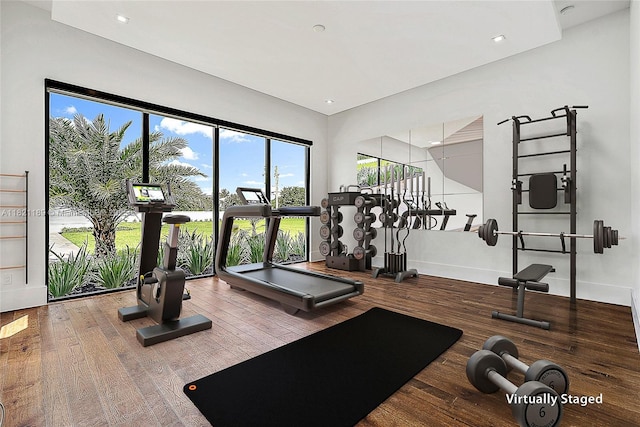 9741 SE Gomez Ave, Hobe Sound, FL 33455 - gym with hardwood / wood-style flooring and recessed lighting
