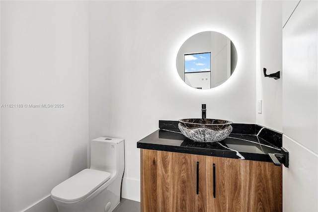9741 SE Gomez Ave, Hobe Sound, FL 33455 - half bathroom featuring vanity and toilet