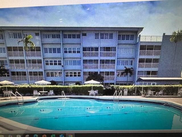 215 SE 3rd Ave Unit 307B, Hallandale Beach, FL 33009 - view of community pool