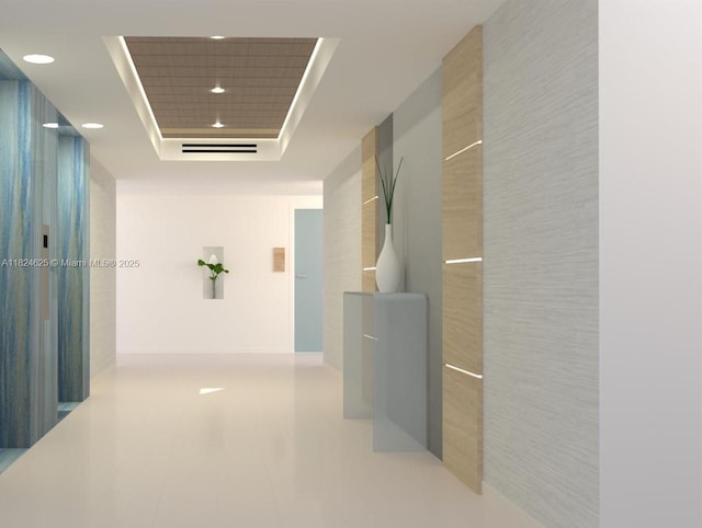 345 Ocean Dr Unit 602, Miami Beach, FL 33139 - hall featuring a raised ceiling and recessed lighting