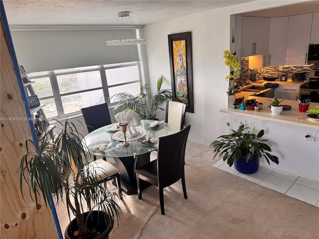 2750 NE 183rd St Unit 2103, Aventura, FL 33160 - dining room featuring light colored carpet and light tile patterned floors