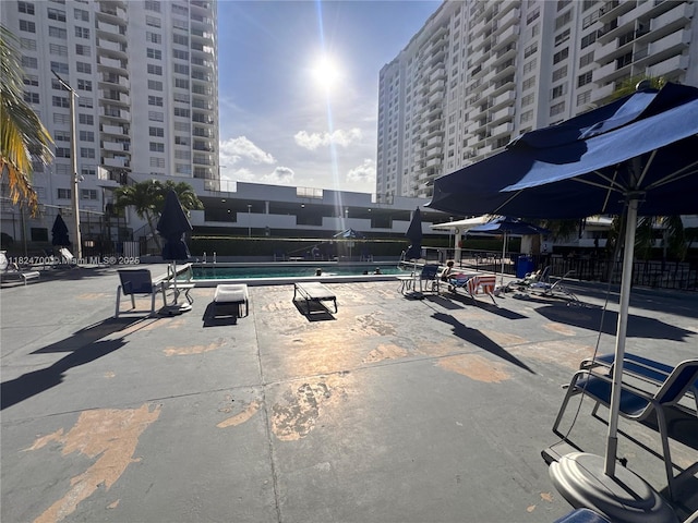 2750 NE 183rd St Unit 2103, Aventura, FL 33160 - community pool featuring a patio and a city view