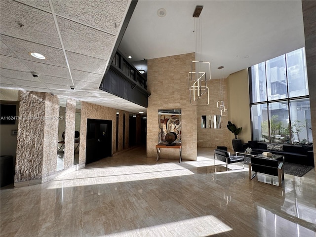 2750 NE 183rd St Unit 2103, Aventura, FL 33160 - community lobby with a high ceiling and a surveillance system