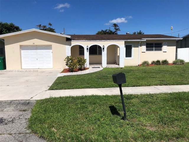 156 SW 126th Ave, Plantation, FL 33325 - ranch-style home with a front lawn, a garage, driveway, and stucco siding