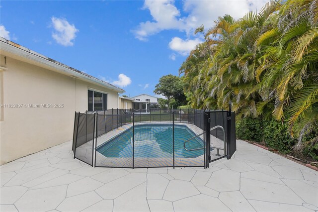 156 SW 126th Ave, Plantation, FL 33325 - view of swimming pool with a patio