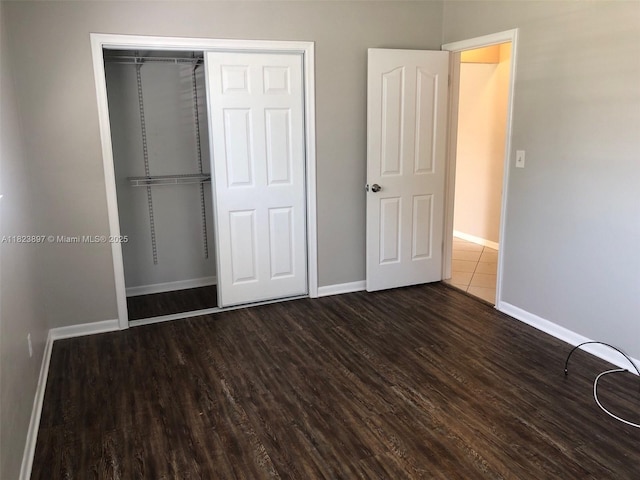 156 SW 126th Ave, Plantation, FL 33325 - unfurnished bedroom with wood finished floors and a closet