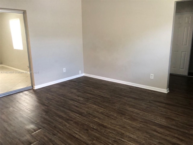 156 SW 126th Ave, Plantation, FL 33325 - spare room with dark wood-style floors and baseboards