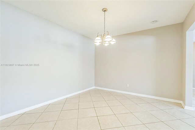 156 SW 126th Ave, Plantation, FL 33325 - empty room with a chandelier, light tile patterned floors, and a smoke detector