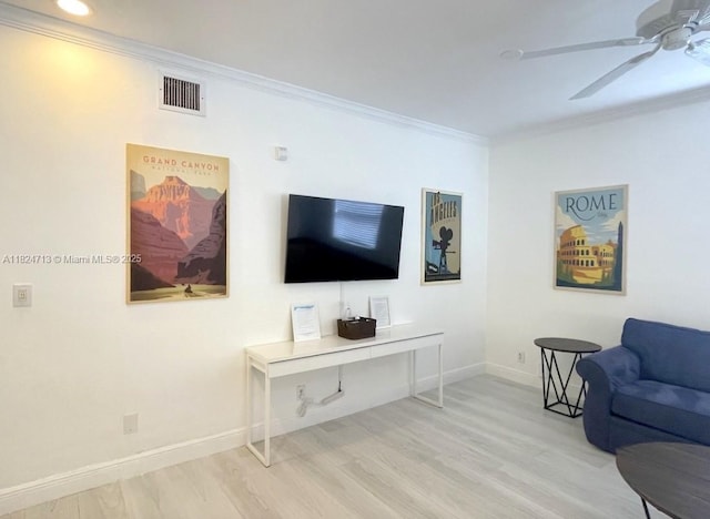 326 Harrison St Unit 303A, Hollywood, FL 33019 - living room with crown molding, wood finished floors, and ceiling fan