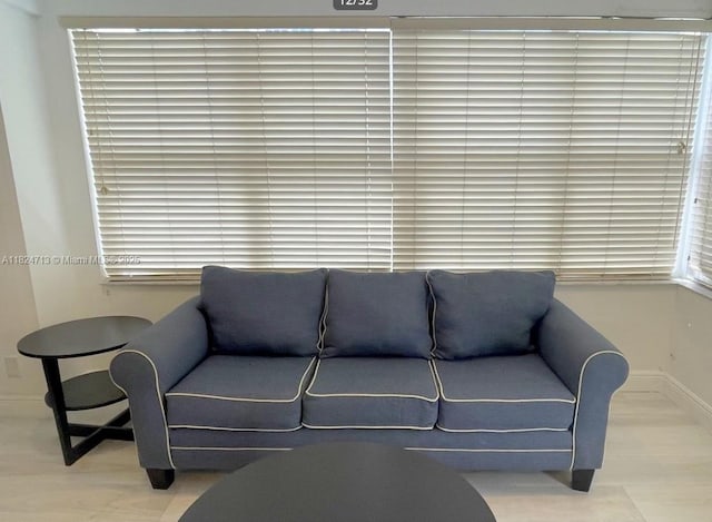 326 Harrison St Unit 303A, Hollywood, FL 33019 - living area featuring baseboards