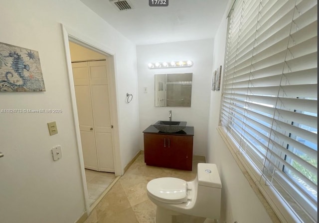 326 Harrison St Unit 303A, Hollywood, FL 33019 - bathroom with plenty of natural light and vanity