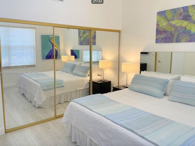 326 Harrison St Unit 303A, Hollywood, FL 33019 - bedroom with a closet and wood finished floors