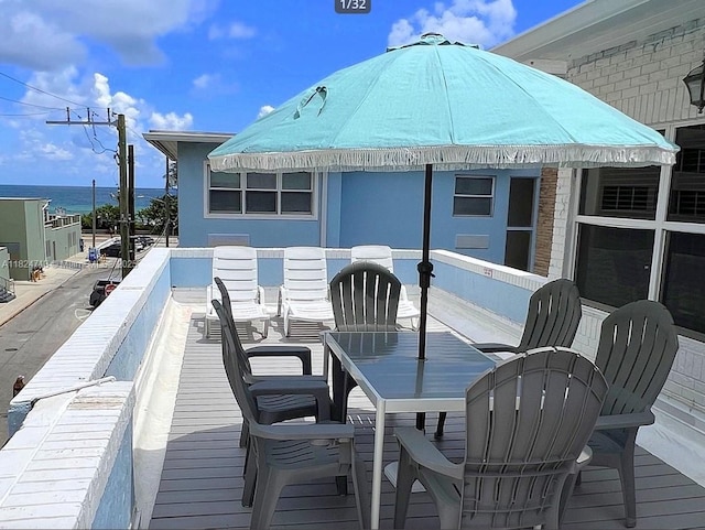 326 Harrison St Unit 303A, Hollywood, FL 33019 - wooden deck featuring outdoor dining space