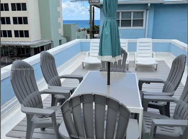 326 Harrison St Unit 303A, Hollywood, FL 33019 - patio / terrace featuring a water view and outdoor dining space