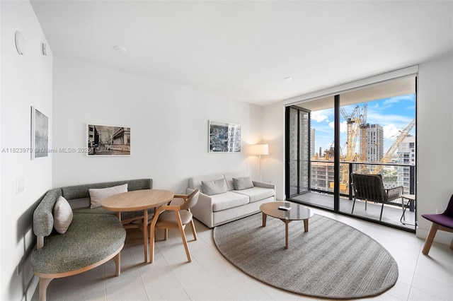 601 NE 1st Ave Unit 2703, Miami, FL 33132 - living room featuring expansive windows, a view of city, and light tile patterned floors