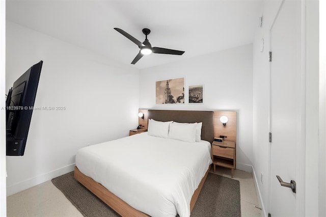 601 NE 1st Ave Unit 2703, Miami, FL 33132 - bedroom featuring baseboards and a ceiling fan