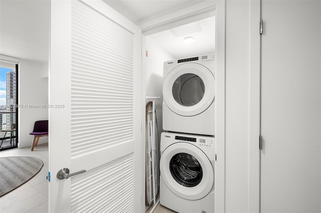 601 NE 1st Ave Unit 2703, Miami, FL 33132 - laundry room featuring stacked washer / dryer