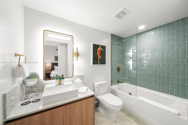 601 NE 1st Ave Unit 2703, Miami, FL 33132 - bathroom featuring vanity, washtub / shower combination, tile patterned floors, and connected bathroom