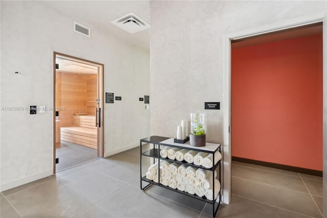 601 NE 1st Ave Unit 2703, Miami, FL 33132 - hall with tile patterned floors and baseboards