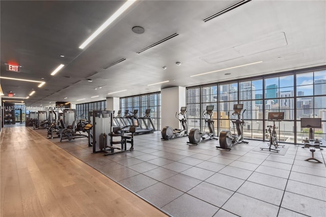 601 NE 1st Ave Unit 2703, Miami, FL 33132 - exercise room with expansive windows and a city view