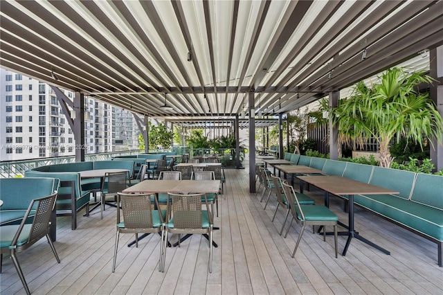 601 NE 1st Ave Unit 2703, Miami, FL 33132 - wooden terrace with outdoor dining space and an outdoor hangout area