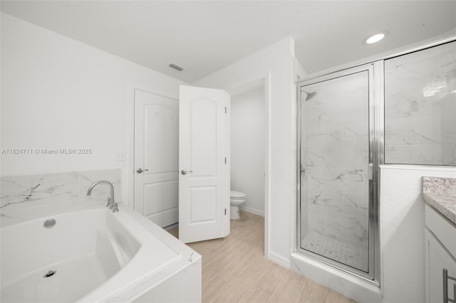 4728 Adrienne St, Sebring, FL 33872 - bathroom featuring a bath, a marble finish shower, vanity, and recessed lighting