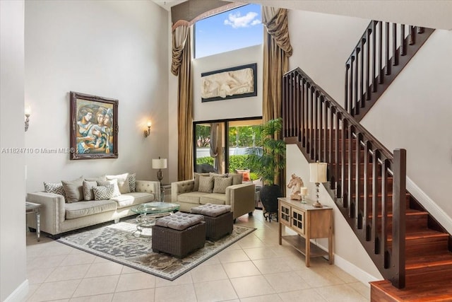 1273 SW 161st Ave, Pembroke Pines, FL 33027 - living room with a high ceiling, tile patterned flooring, and stairway