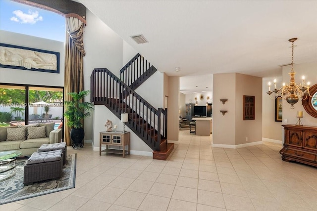 1273 SW 161st Ave, Pembroke Pines, FL 33027 - living area with a chandelier, light tile patterned flooring, and stairs