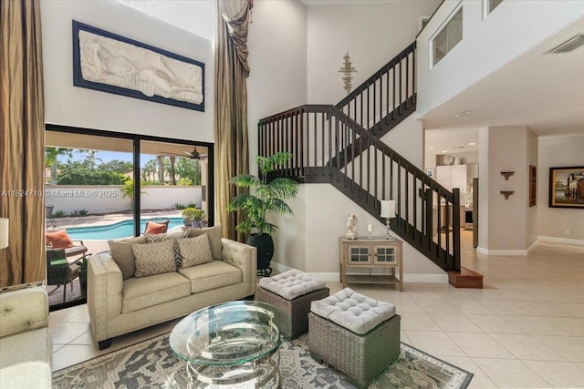 1273 SW 161st Ave, Pembroke Pines, FL 33027 - living area featuring a high ceiling, tile patterned floors, and stairs