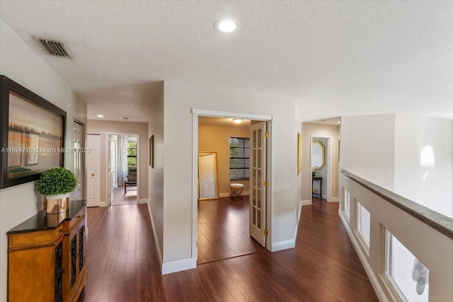 1273 SW 161st Ave, Pembroke Pines, FL 33027 - corridor with a textured ceiling and dark wood-style floors