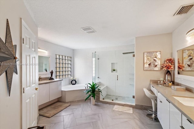 1273 SW 161st Ave, Pembroke Pines, FL 33027 - bathroom featuring a garden tub, vanity, and a shower stall