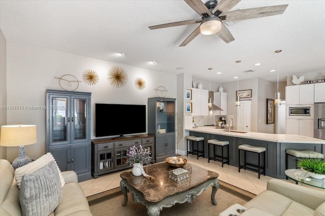 1273 SW 161st Ave, Pembroke Pines, FL 33027 - living room featuring light tile patterned flooring, a ceiling fan, and recessed lighting