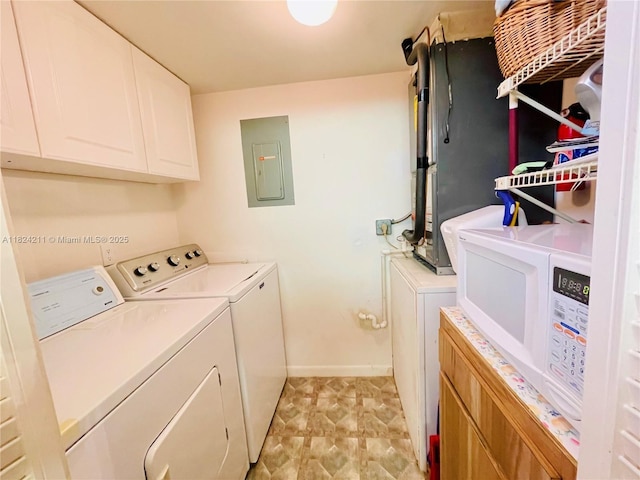 224 Pine Hov Cir Unit D-2, Green Acres, FL 33463 - washroom with electric panel, independent washer and dryer, and cabinet space