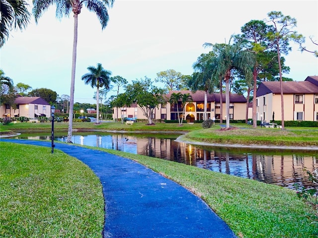 224 Pine Hov Cir Unit D-2, Green Acres, FL 33463 - view of community with a yard, a water view, and a residential view