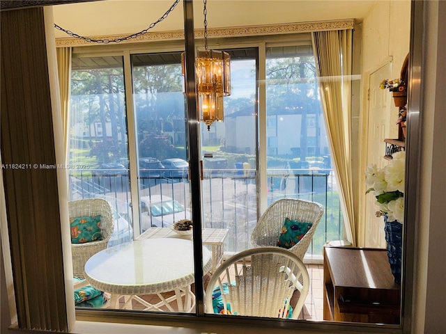 224 Pine Hov Cir Unit D-2, Green Acres, FL 33463 - dining area with healthy amount of natural light and a chandelier