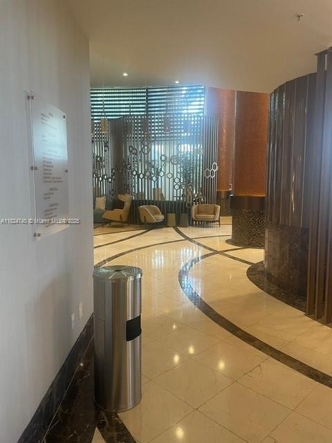 18001 Collins Ave Unit 502, Sunny Isles Beach, FL 33160 - hall featuring inlaid floor details