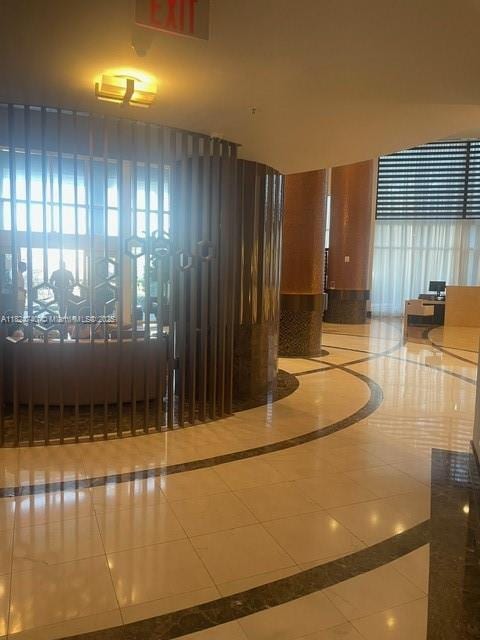 18001 Collins Ave Unit 502, Sunny Isles Beach, FL 33160 - corridor with inlaid floor details and tile patterned floors